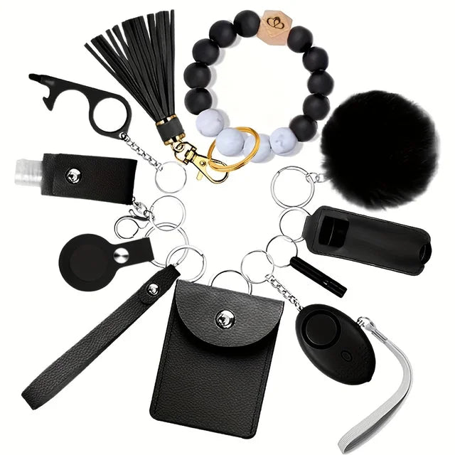 12 件装新款女士安全钥匙扣套装带礼品包装,女士钥匙扣套装采用 PU 仿皮制成,带个人报警装置